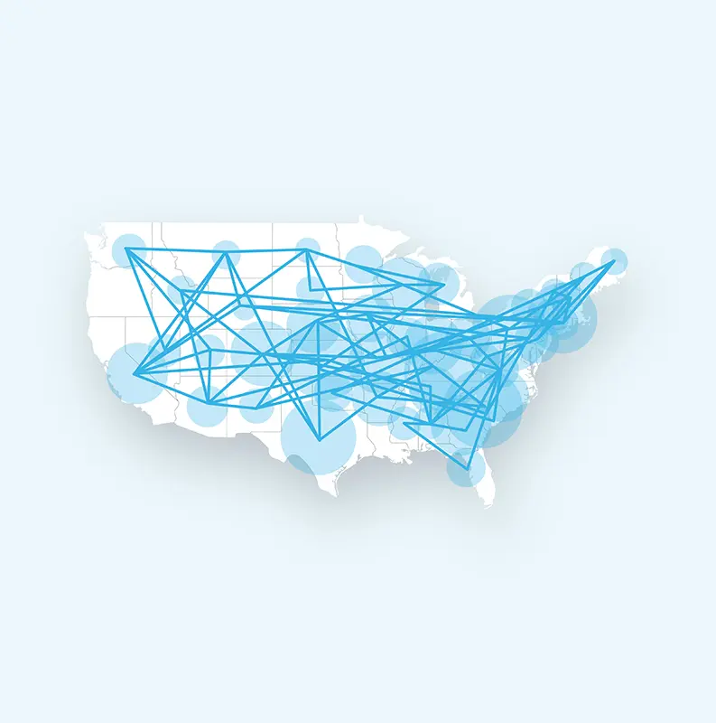 A map of the United States with overlapping blue lines and circles connecting major cities, illustrating a freight tracking system or network of interconnected locations.