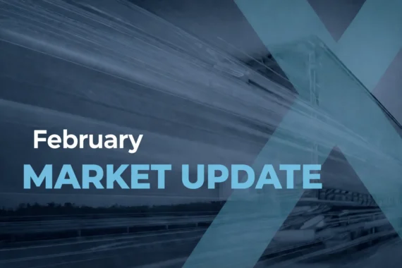 February Market Update text over blurred highway with blue geometric overlay