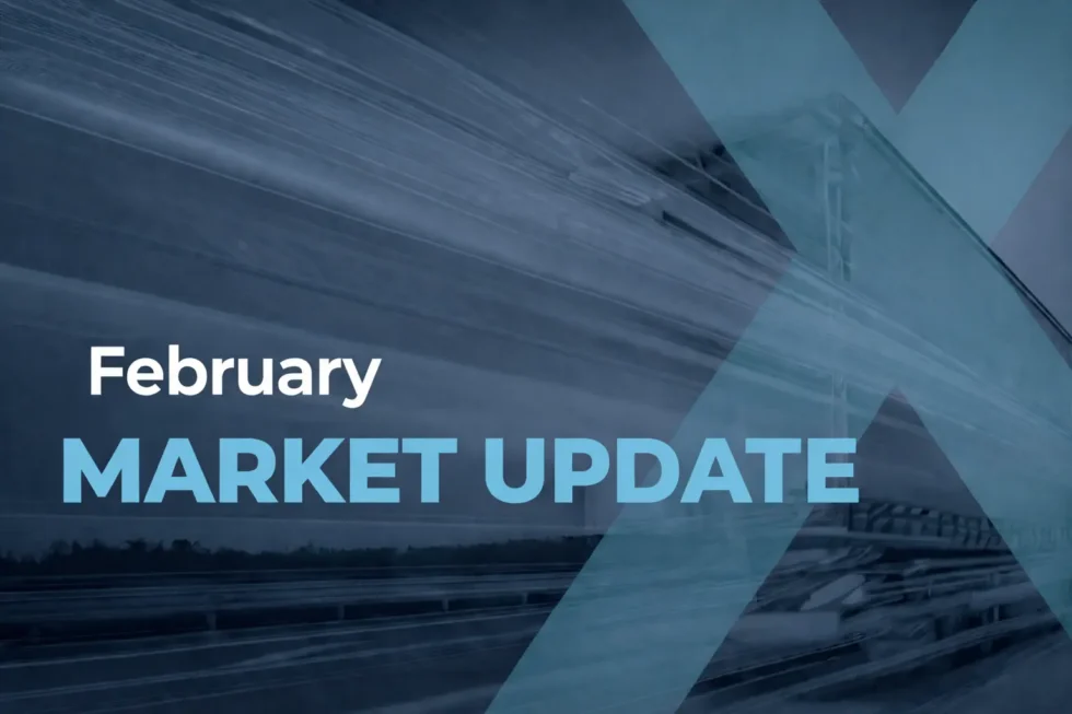 February Market Update text over blurred highway with blue geometric overlay