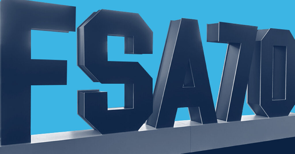 Large three-dimensional dark block letters spelling out FSA70 against a solid blue background.